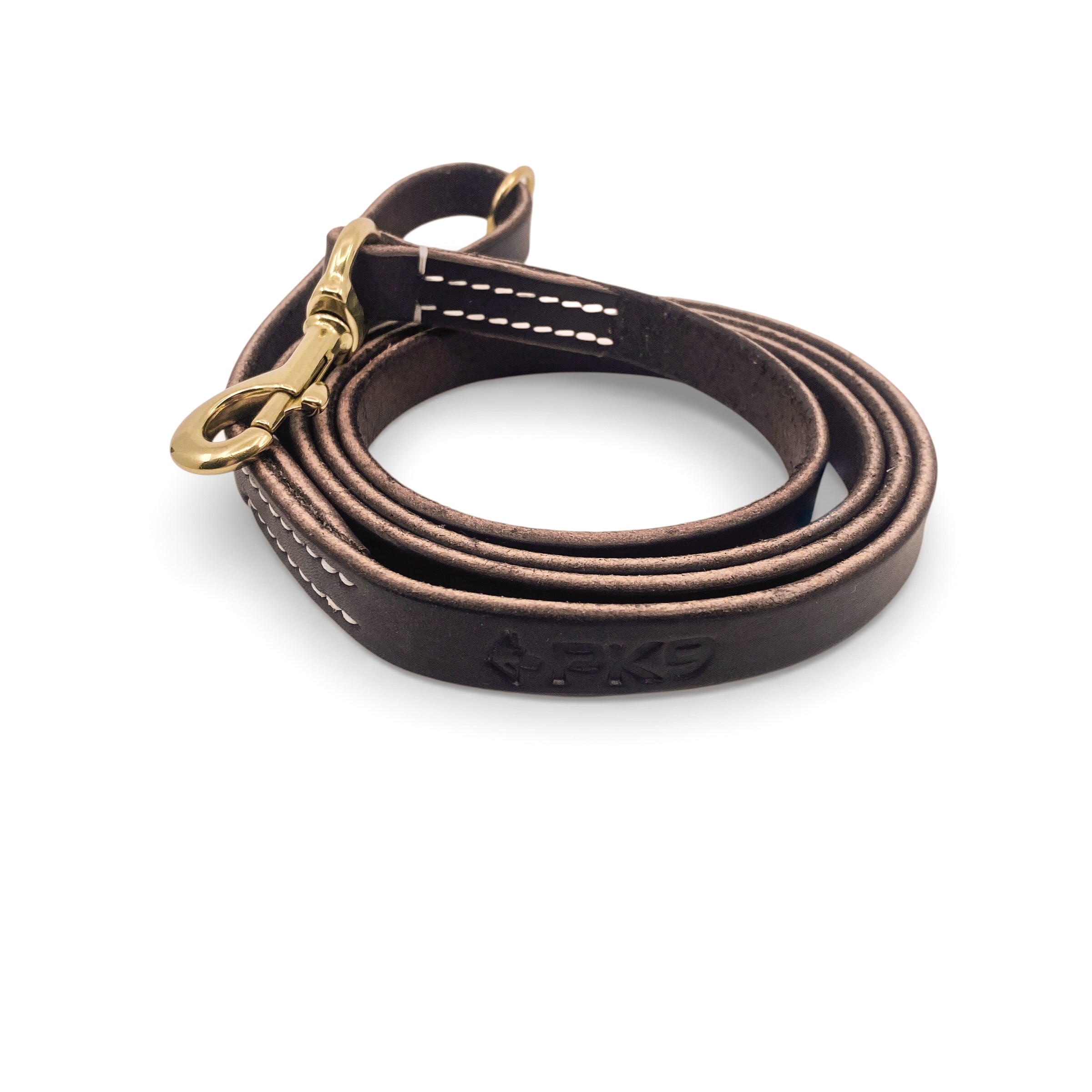 Brown leather dog leash with brass clip on a white background