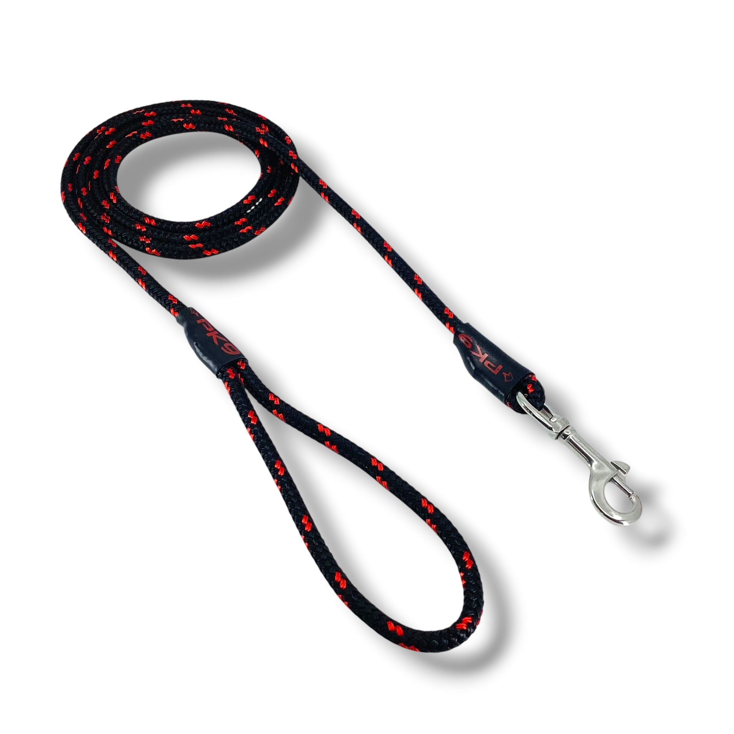Black dog leash with red patterns on a white background
