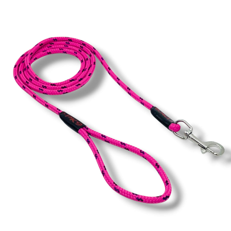Pink dog leash with black speckles on a white background