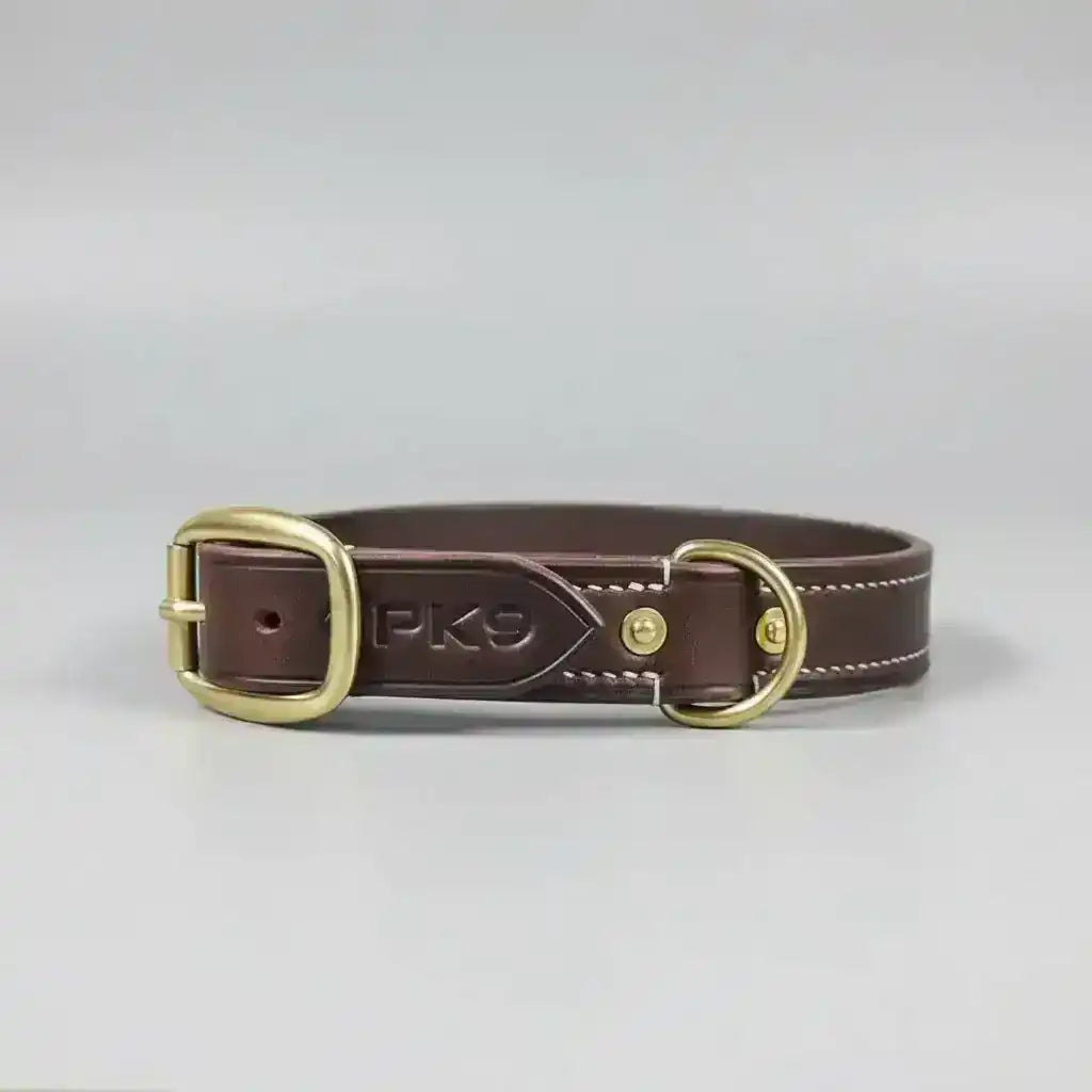 Brown leather dog collar with 'PK9' branding 