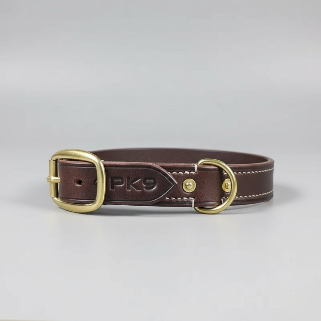 Brown leather dog collar with 'PK9' branding 