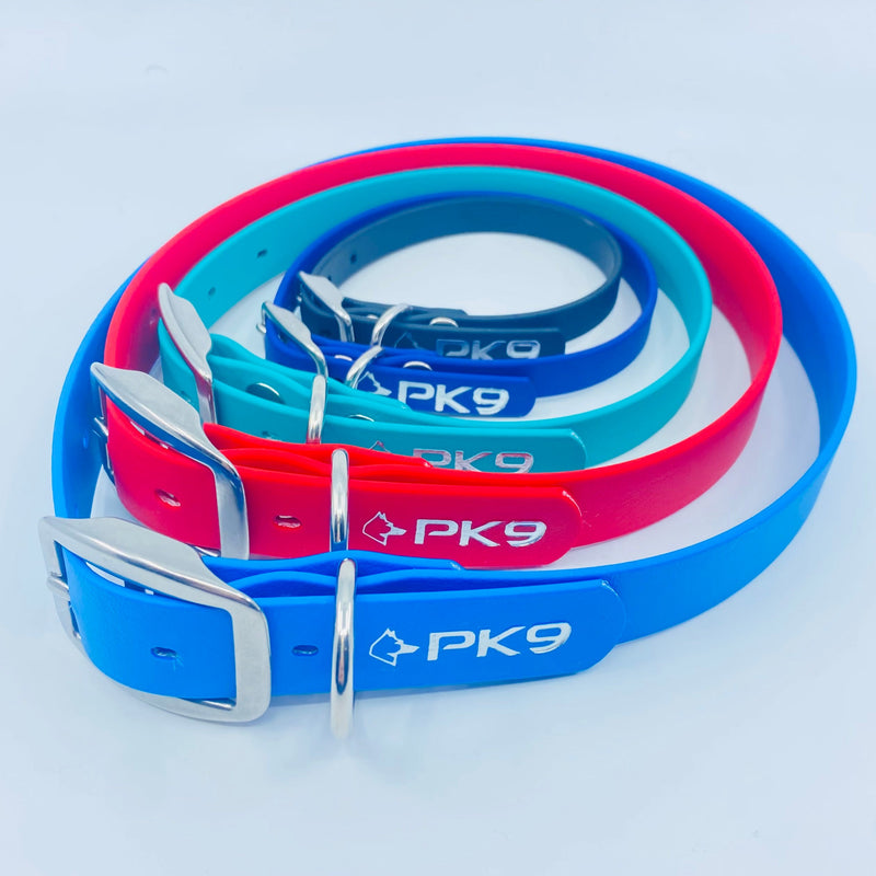 Set of blue and red dog collars with 'PK9' branding on a light gray background